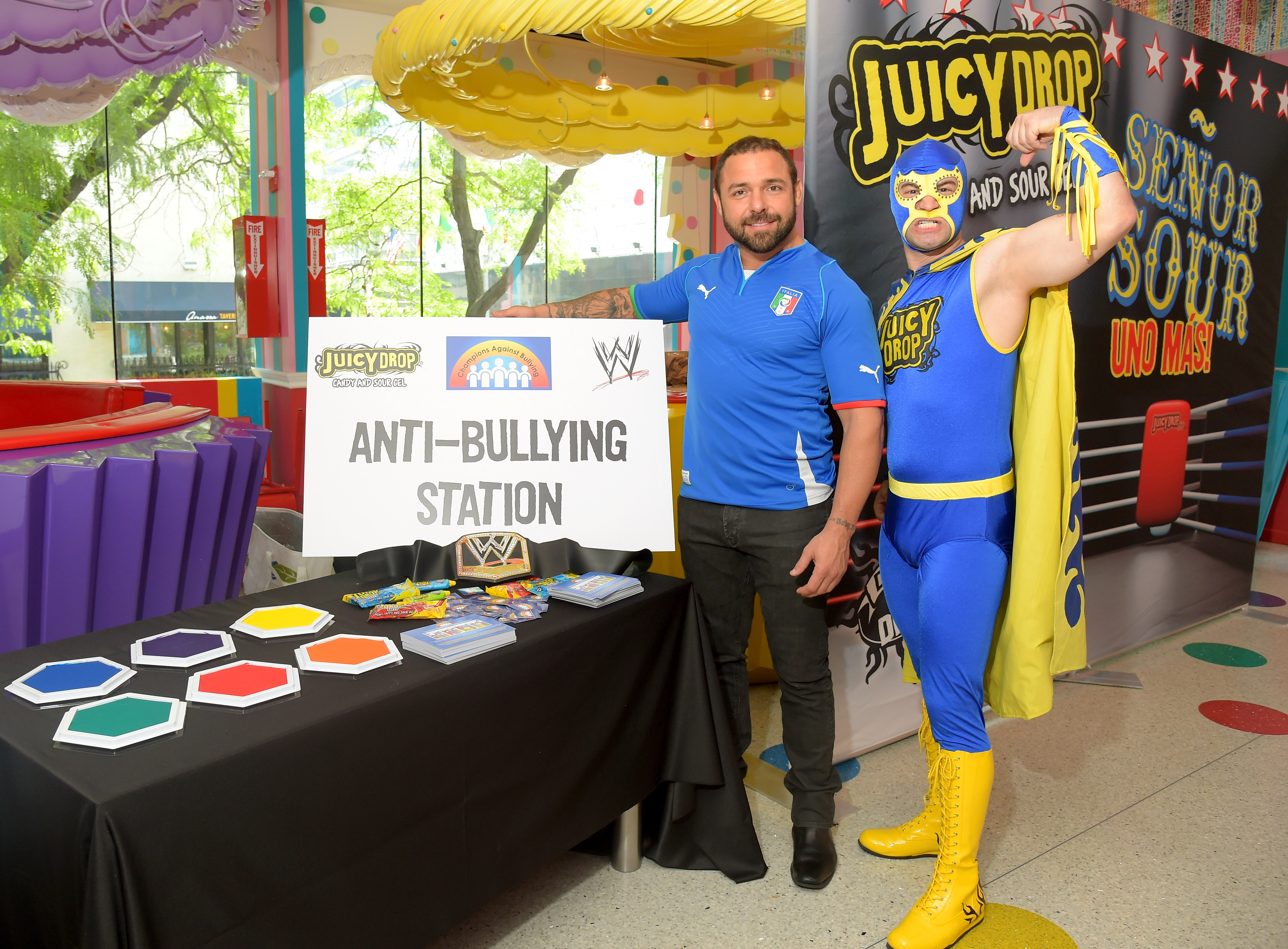 NEW YORK, NY - JULY 02: Senor Sour (R) and Santino Marella attend Juicy Drop and WWE Superstar Santino Marella dare kids to test their limits benefitting Champions Against Bullying at Dylan's Candy Bar on July 2, 2014 in New York City. (Photo by Michael Loccisano/Getty Images for Bazooka Candy Brands/Topps)