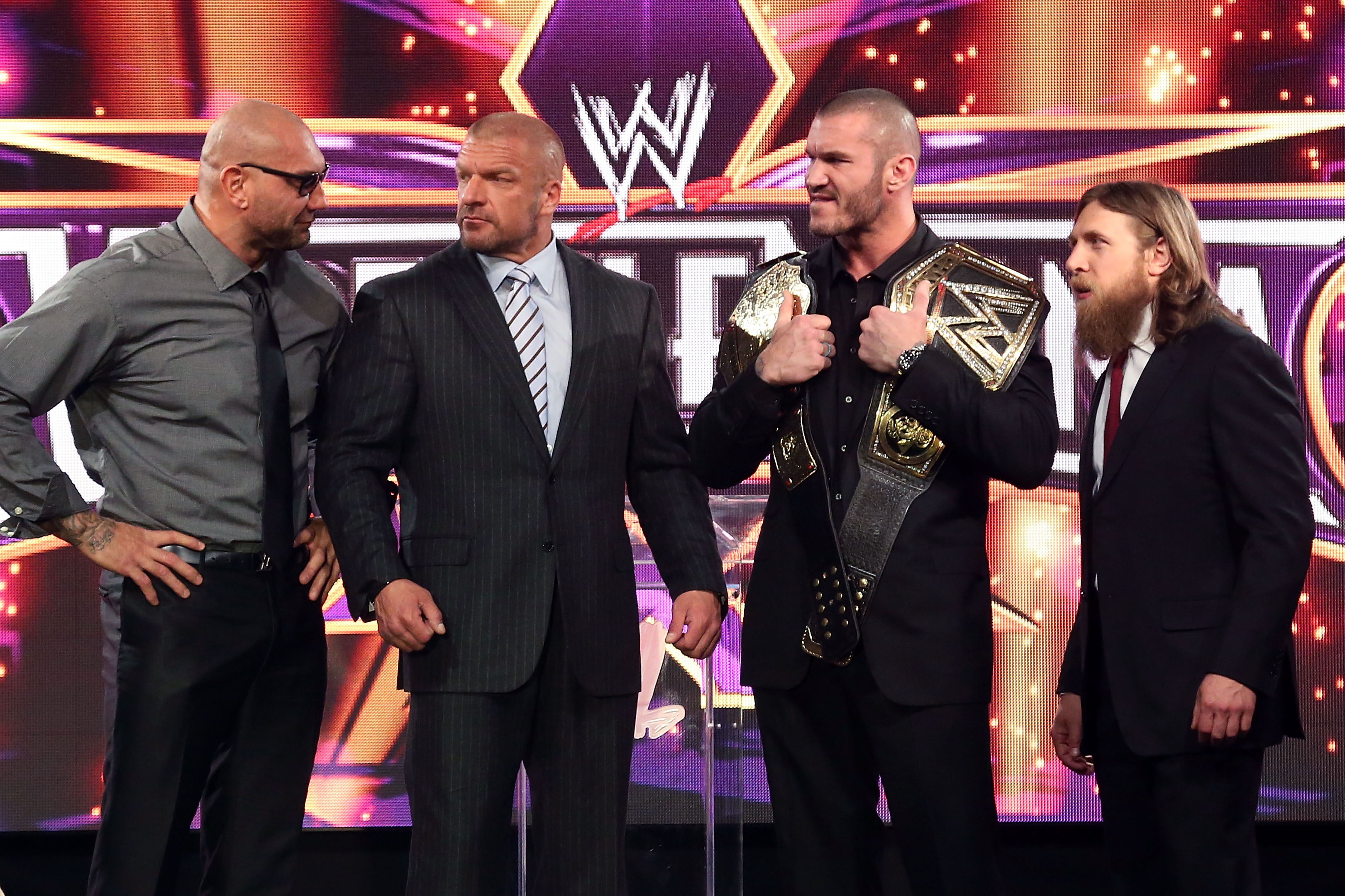 NEW YORK, NY - APRIL 01: Dave Batista, Triple H, Randy Orton, and Daniel Bryan attend the WrestleMania 30 press conference at the Hard Rock Cafe New York on April 1, 2014 in New York City. (Photo by Taylor Hill/WireImage)