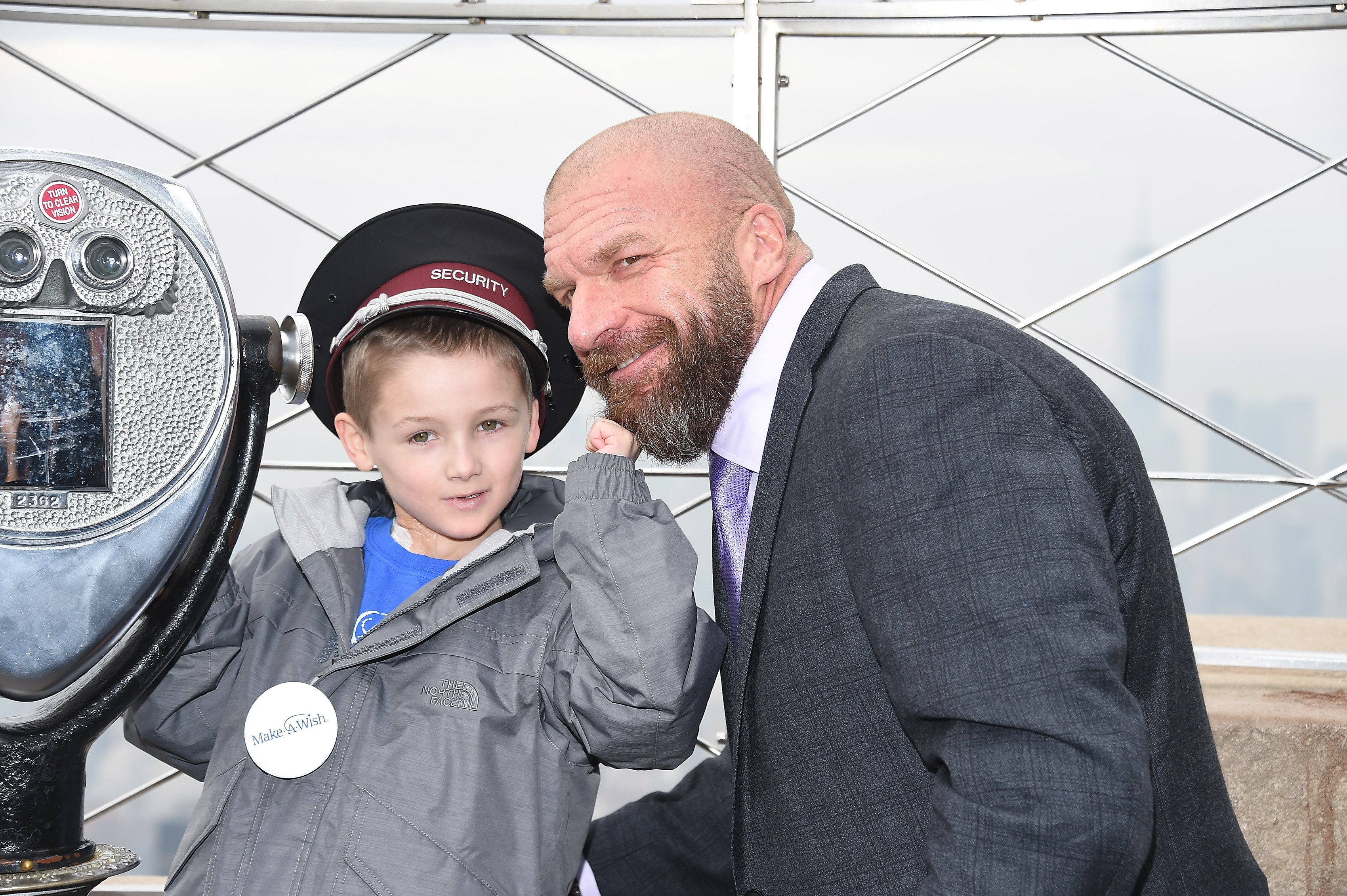 Triple H, Stephanie McMahon & Dana Warrior Turn The Empire State Build Red For RAW 25 (Photo Gallery)