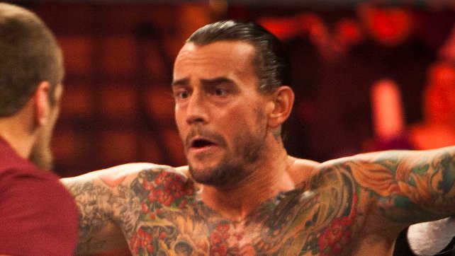 CM Punk’s UFC Career Over?; Chris Jericho And Kenny Omega With Their IWGP Titles (Photo)