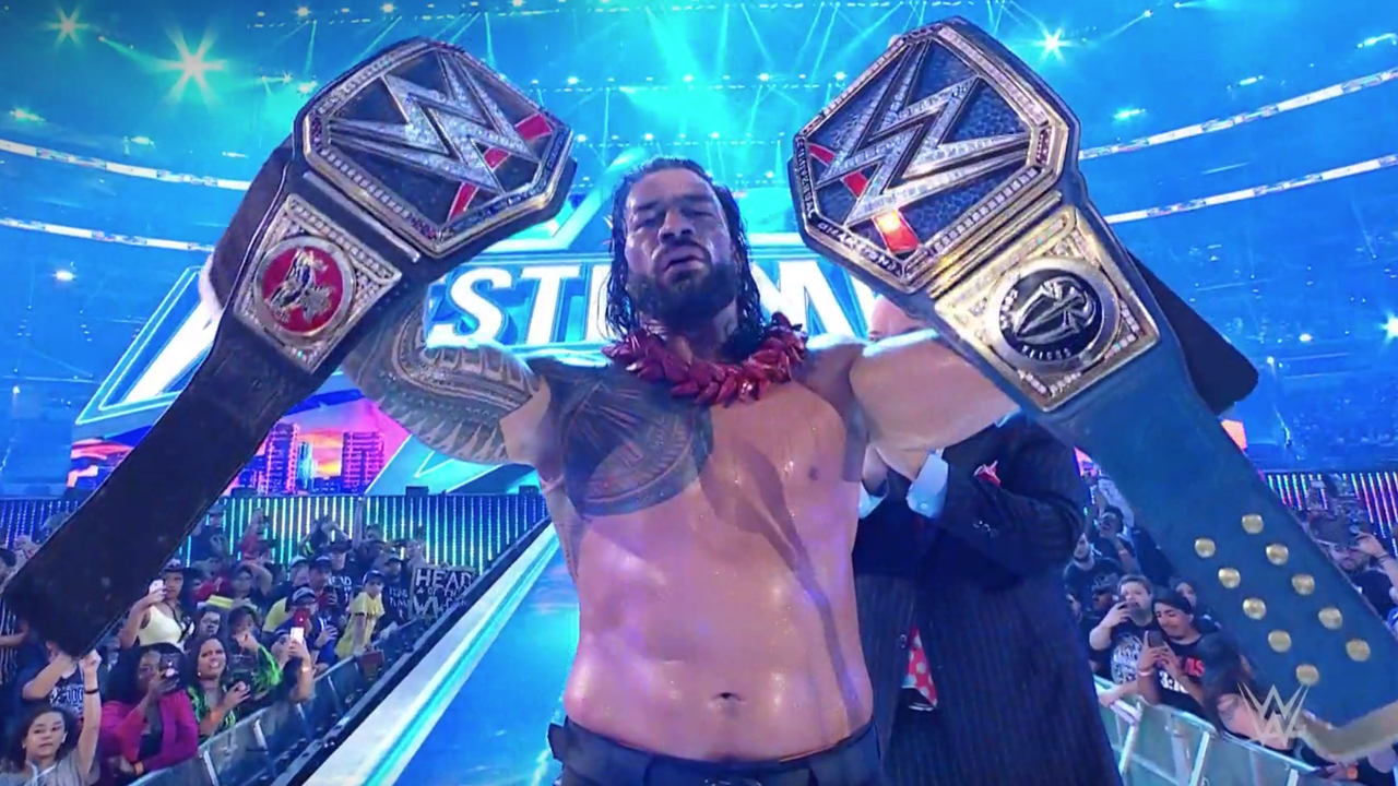 Roman Reigns Unifies WWE's World Titles At WWE WrestleMania 38